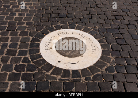 Marker tile at the centre point of Bernini`s colonnade in St Peter`s square in Rome Italy Stock Photo